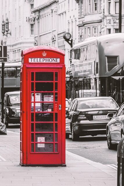 Iconic red telephone box on a London street