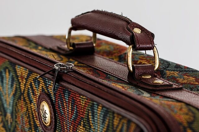 Suitcase packed for a UK travel trip